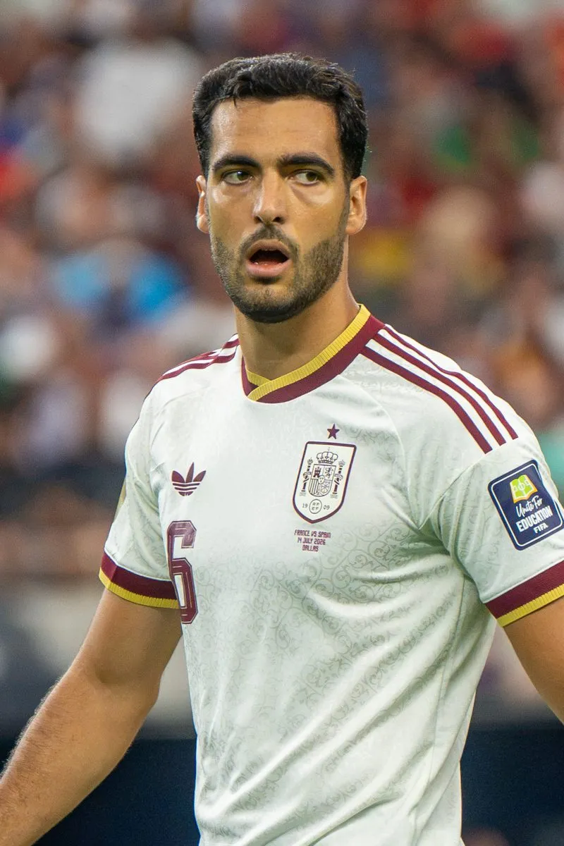 Mikel Merino in Spain's white away kit during a Nations League match