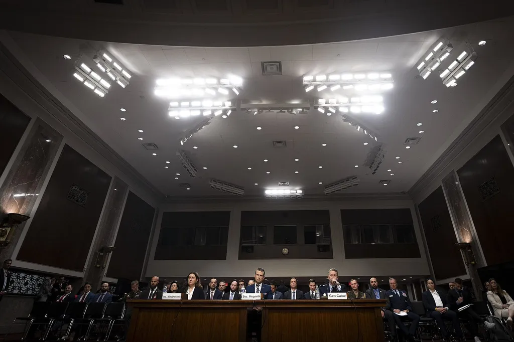 US Defence Secretary Pete Hegseth testifying before the Senate Armed Services Committee alongside Gen Dan Caine, June 2025