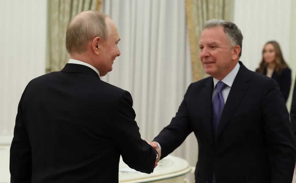 Vladimir Putin shakes hands with US envoy Steve Witkoff at a meeting in January 2026
