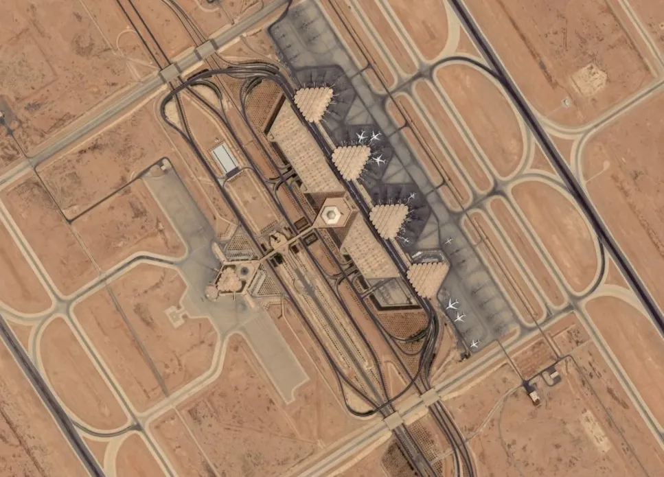 Aerial photograph of King Khalid International Airport in Riyadh, showing the terminal buildings and parked aircraft near where a Houthi missile attack sparked a fire on 19 September 2026.