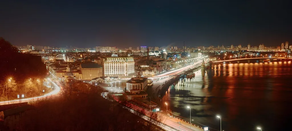 Night view of Kyiv's Podil district across the Dnipro River, Ukraine (file photo; not the strikes of 22 October)