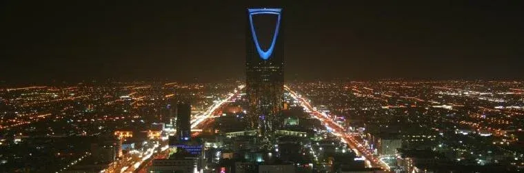 Riyadh skyline at night, with the Kingdom Centre Tower, host city of the postponed Future Investment Initiative investor summit