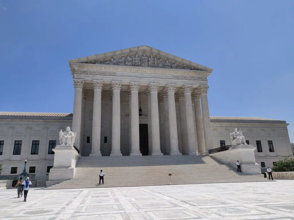 Front facade of the US Supreme Court building in Washington, DC, showing the Corinthian columns and 'Equal Justice Under Law' pediment