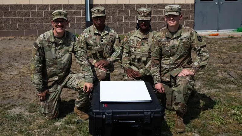 U.S. Army Reserve soldiers with a Starshield satellite terminal at Fort McCoy, Wisconsin