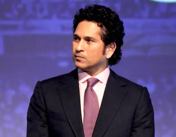 Sachin Tendulkar in a suit and tie at a public event