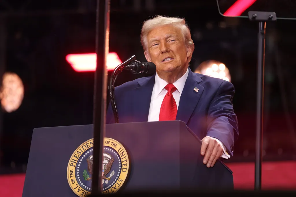 Donald Trump speaking at a podium bearing the presidential seal