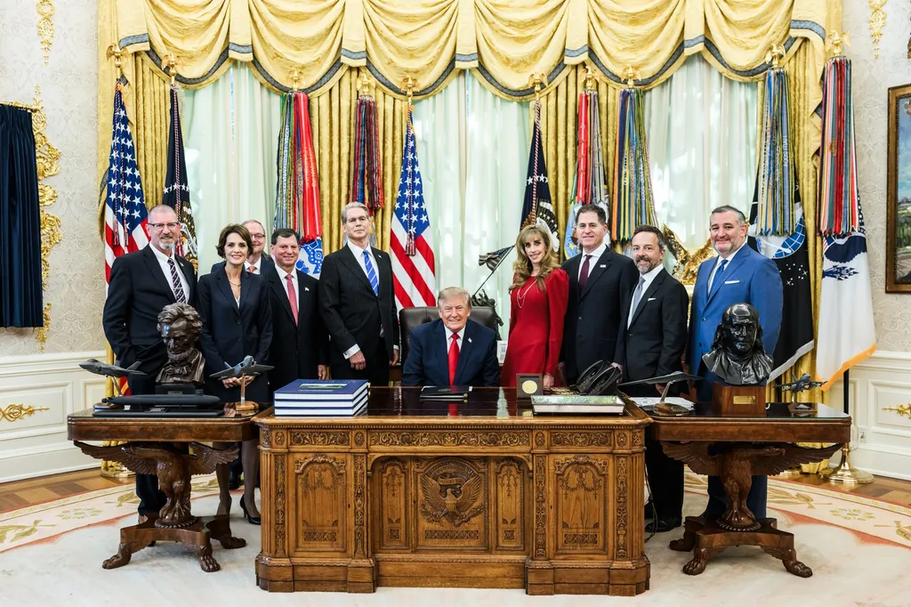 US President Donald Trump seated at the Resolute Desk in the Oval Office, October 2026