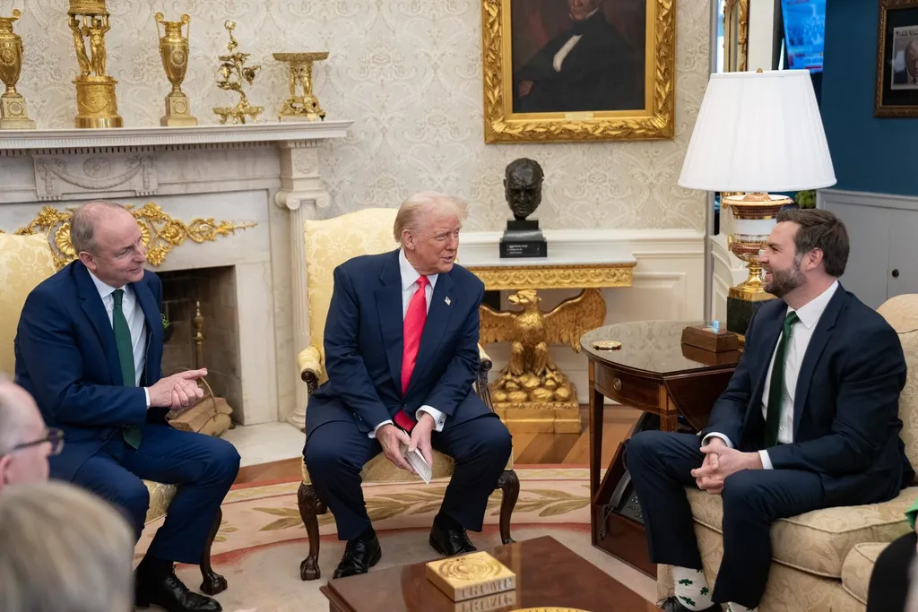 President Donald Trump and Vice President JD Vance seated in the Oval Office.