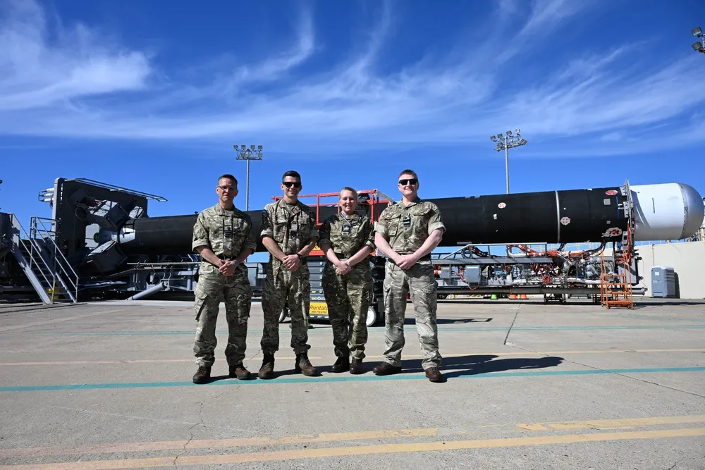 Air Vice-Marshal Jamie Thompson (far right) with UK Space Command personnel in front of a Firefly rocket at Vandenberg Space Force Base, February 2025