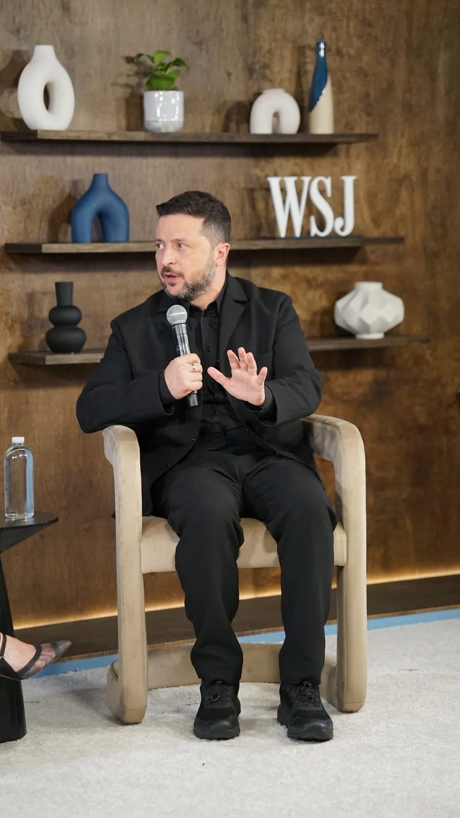 Volodymyr Zelenskyy speaking into a microphone at a Wall Street Journal event in New York in September 2026